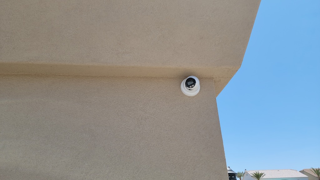 Cameras on a stucco home
