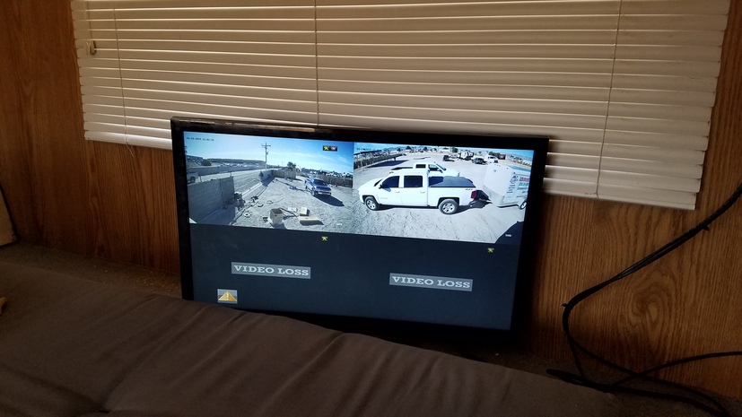 A video monitor showing twmages from two high definition IP cameras